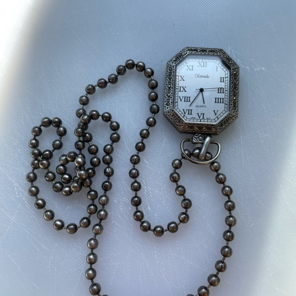 Xanadu necklace vintage watch